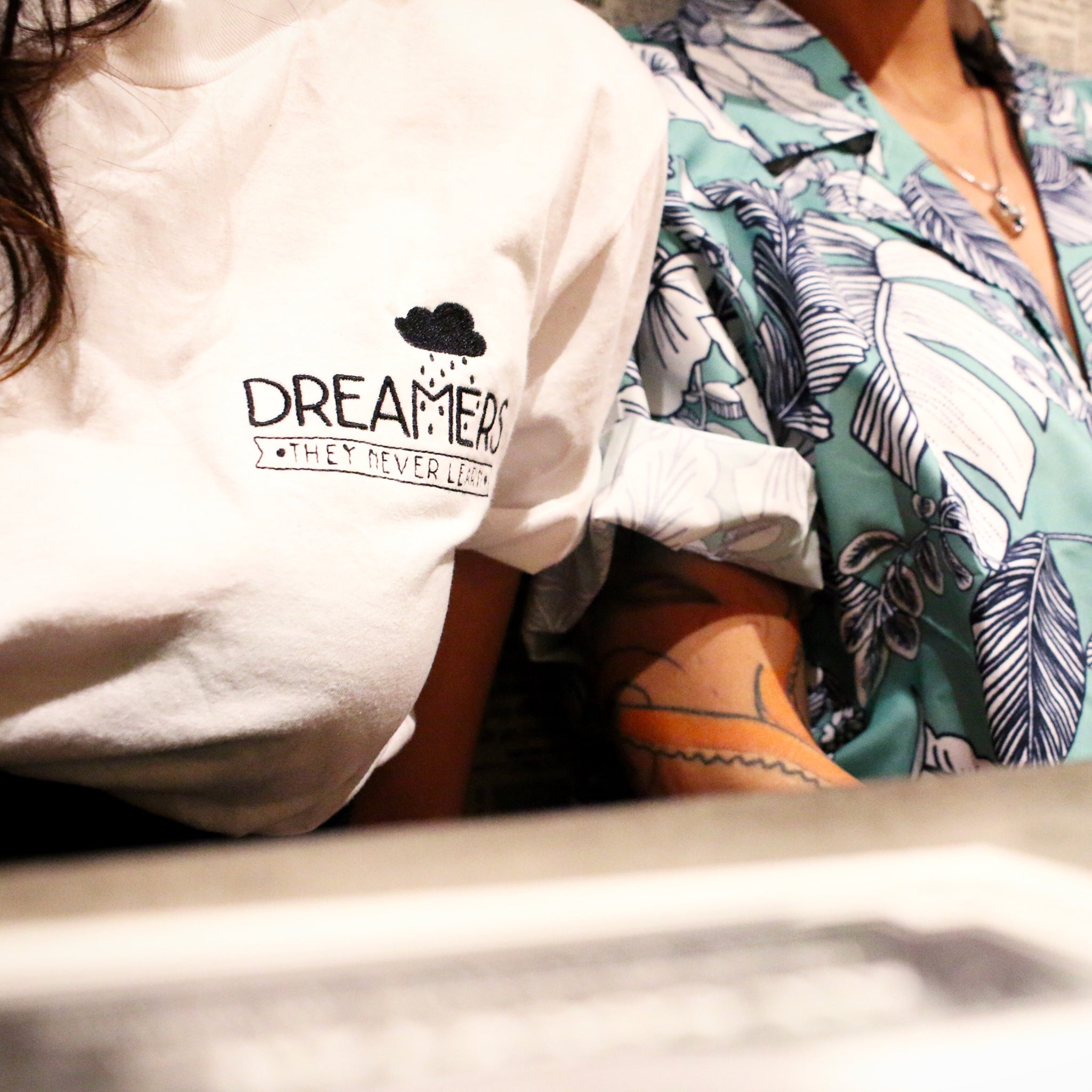 "Dreamers, They Never Learn" Embroidered Unisex T-Shirt